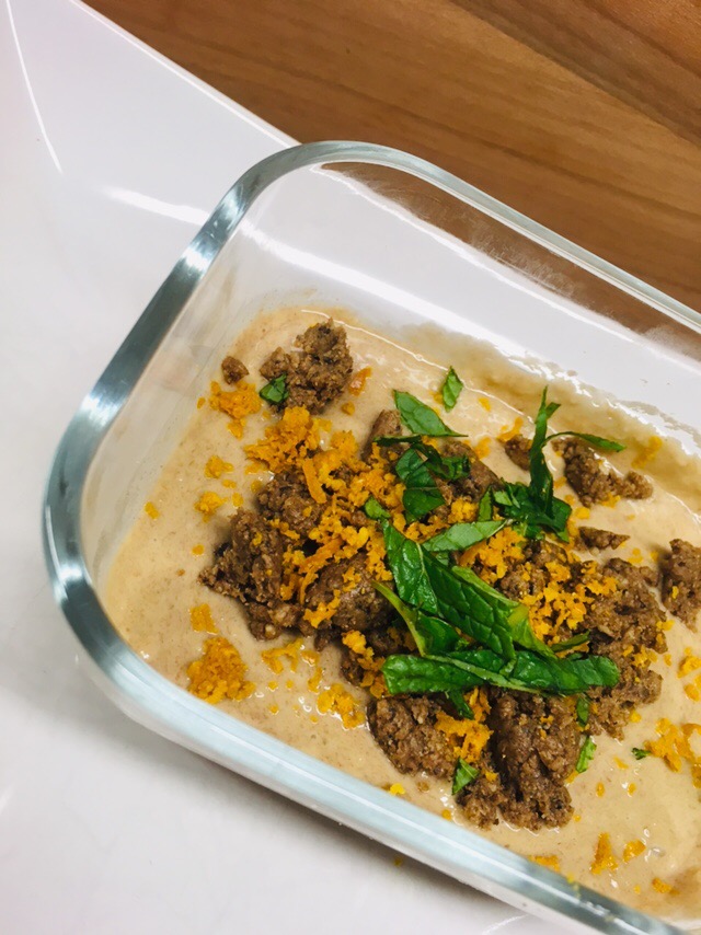 Kaki Cashew Creme mit Mohnstreusel